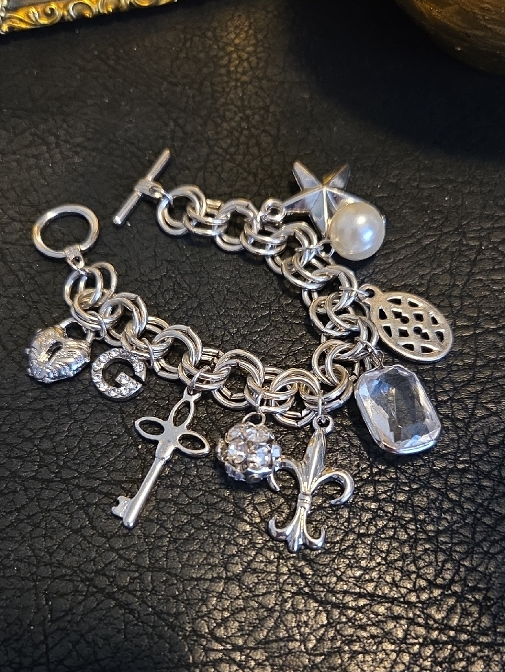Vintage Guess Silver Charm Bracelet with Pearl, Crystal and Fleur-de-Lis Accents